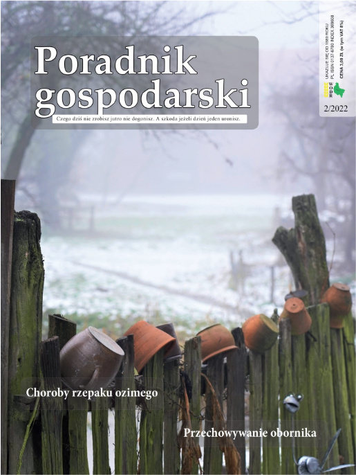 Okładka lutowego numeru Poradnika Gospodarskiego. Na okładce jest napis "Poradnik Gospodarski" oraz zdjęcie glinianych garnków na drewnianym płocie